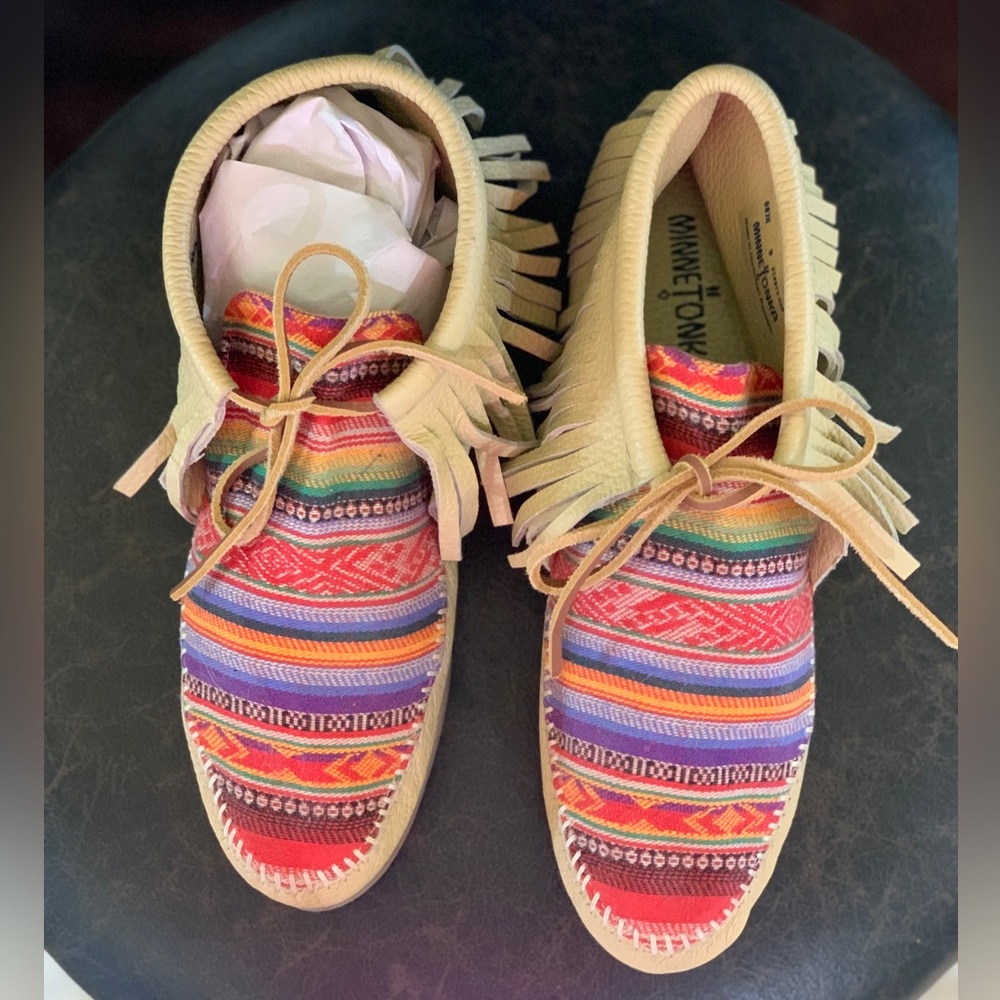 Minnetonka moccasins.Never worn